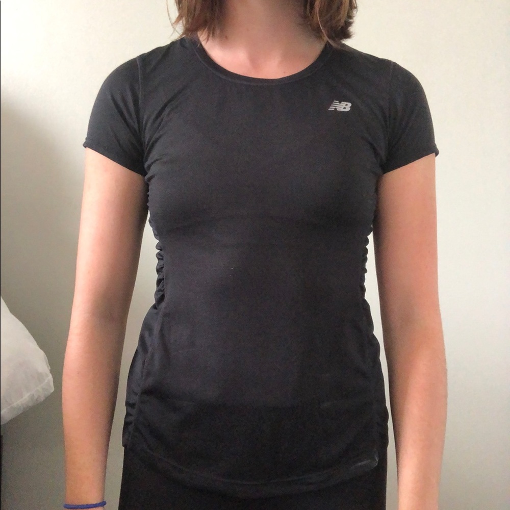 New Balance running shirt with rousing